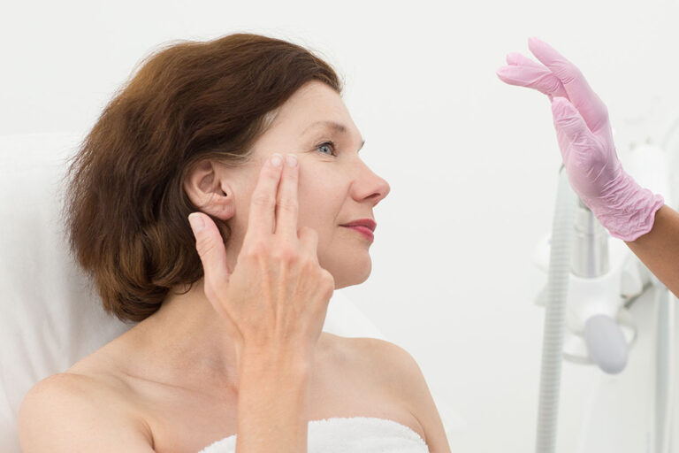 Patient consultation for TRL Laser skin rejuvenation treatment at Olympia Aesthetics