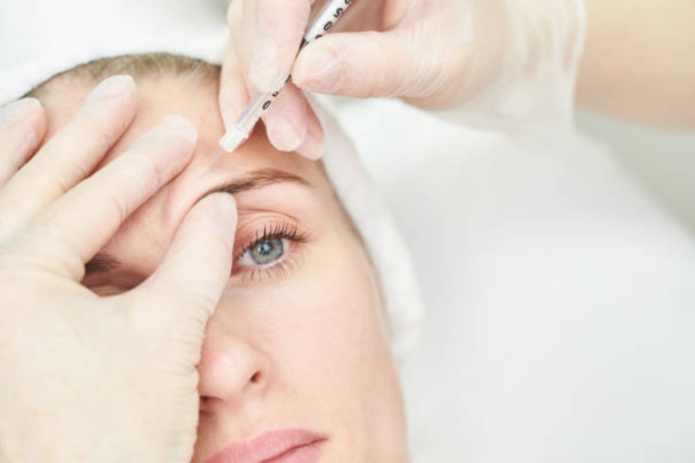 Close-up of Restylane lip injection procedure at Olympia Aesthetics