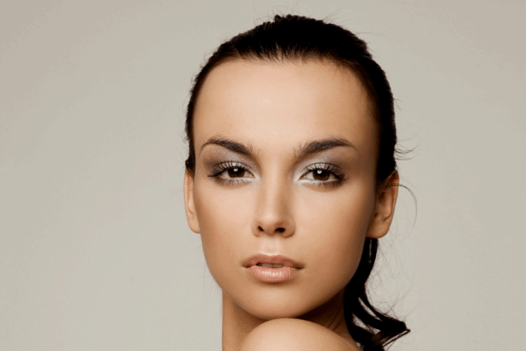 Close-up of a woman's healthy, clear skin, showing the regenerative effects of Exosomes and Polynucleotides.