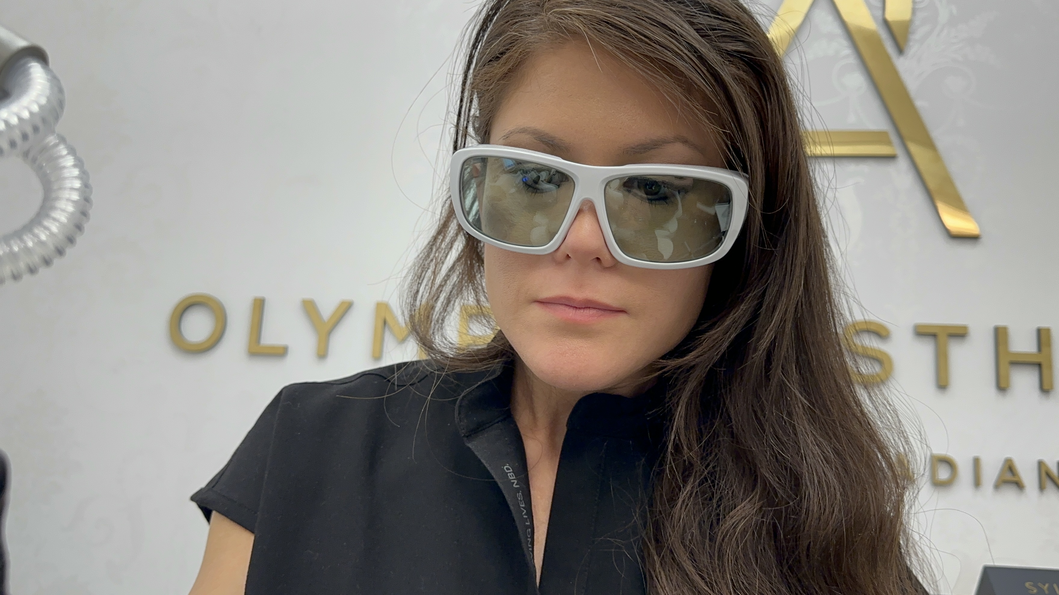 Olympia Morris, PA-C performing a Sciton HALO TRIBRID laser treatment at Olympia Aesthetics in Palm Harbor