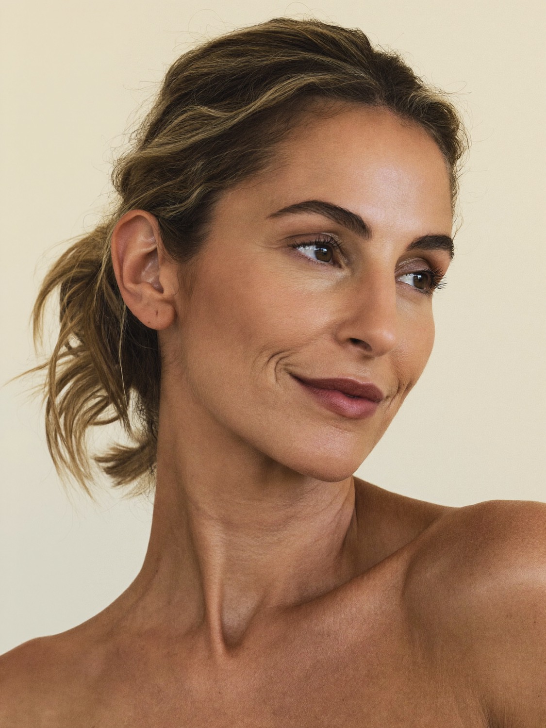 Woman with a slim, defined jawline and chin profile after Kybella at Olympia Aesthetics in Palm Harbor, Florida
