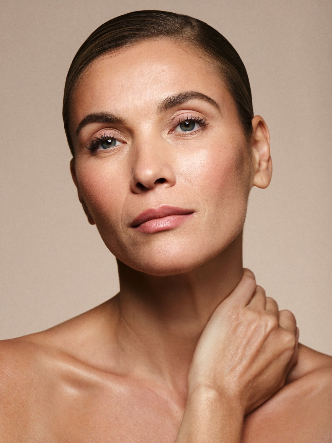 Woman with clear, even, glowing skin after a VI Peel at Olympia Aesthetics in Palm Harbor, Florida
